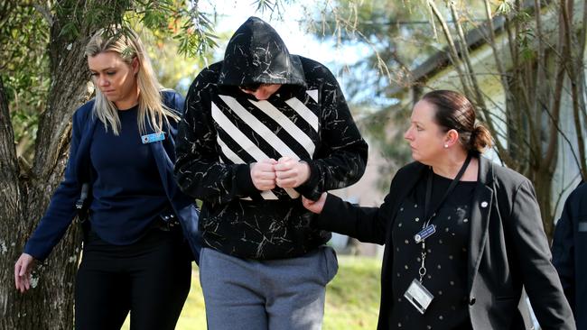 Officers from the Australian Federal Police and NSW Police have made arrests after conducting a search in Kendall, near where William Tyrrell disappeared. Picture: Nathan Edwards