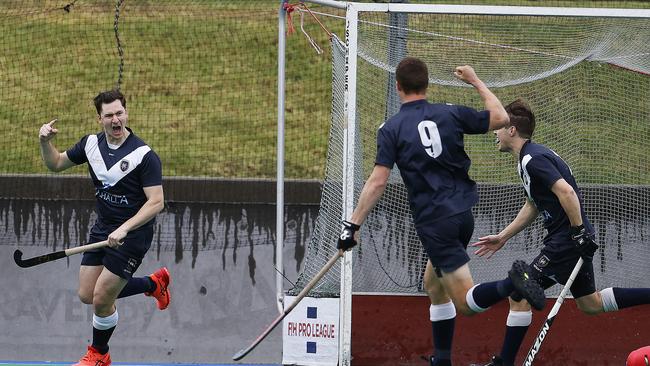 Derwent's Angus Boulton celebrates his goal with team mates in a 2020 semi-final. Picture: Zak Simmonds