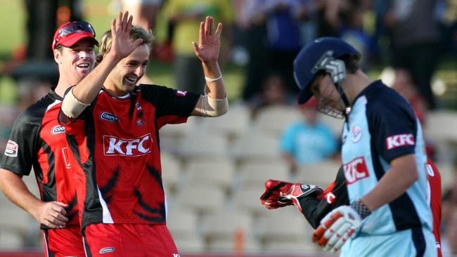 Nathan Lyon celebrates his wicket of Nic Maddinson in a Big Bash match in 2011. 