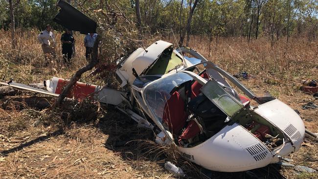 Three men miraculously survived this helicopter crash in Kakadu. The helicopter a Bell 206 crashed about 111km southwest of Jabiru just after 10am on Tuesday May 21. Picture: NT Police