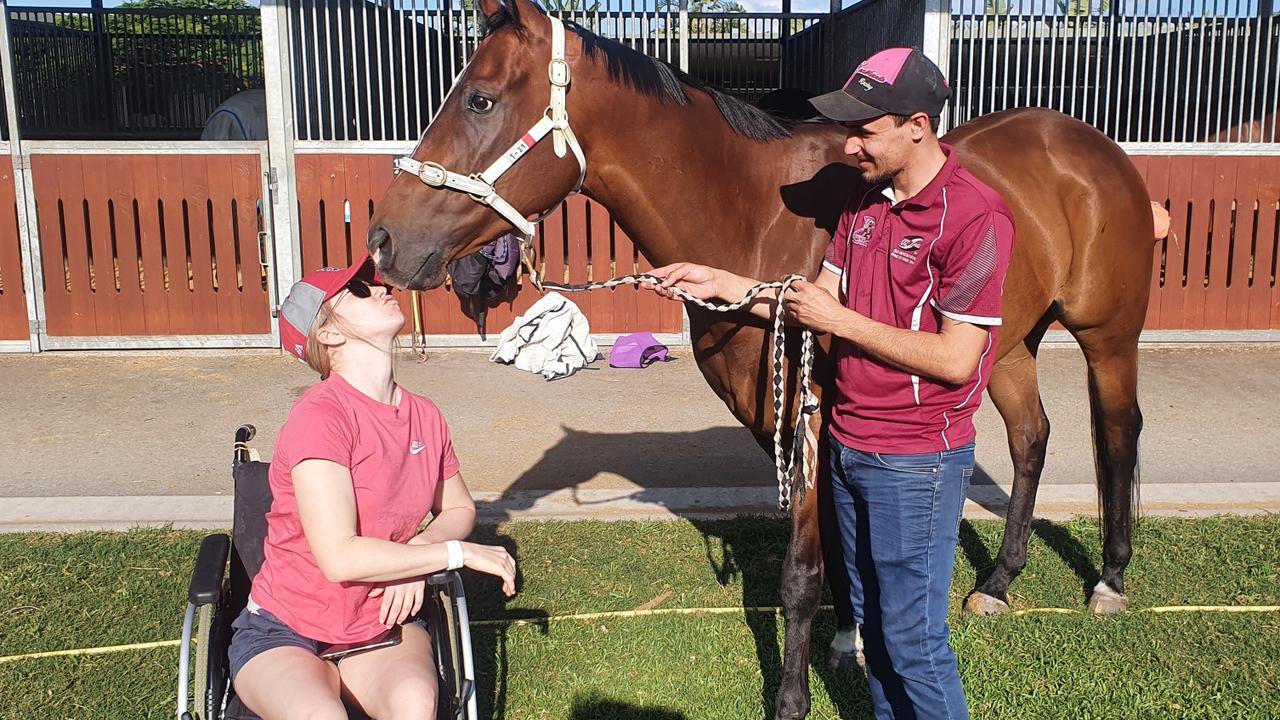 Leah Kilner visiting Rob Heathcote's stable after leaving hospital for the first time. Leah wanted so much to give a kiss to her favourite horses and Danezel was high on that list. Picture: Rob Heathcote