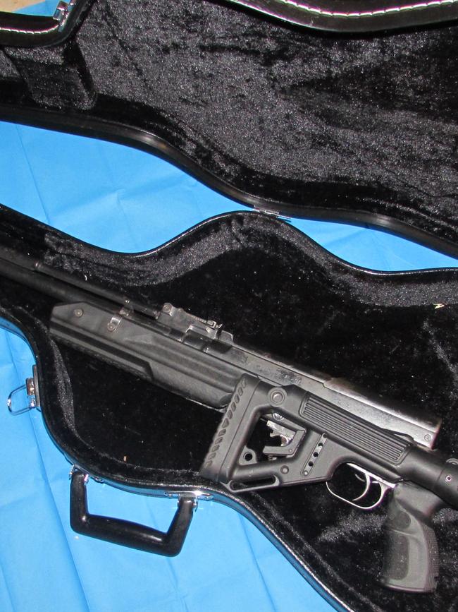 Bruce hid his SKS military assault rifle in a guitar case.