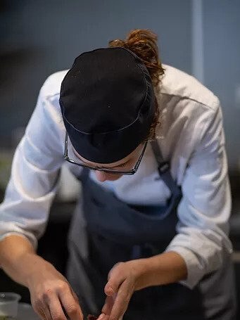 Chef Helen Turnbull at work in her restaurant, 50-50.