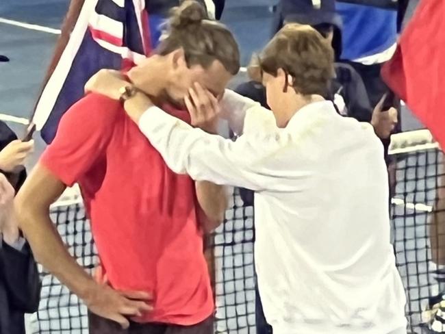 Jannik Sinner consols Alexander Zverev. Picture: Chantelle Francis