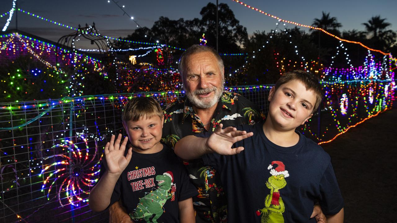 David Waldron shares his Christmas lights display with his grandsons Liam (left) and Alexander Waldron at his Gowrie Junction home, Monday, December 20, 2021. Picture: Kevin Farmer