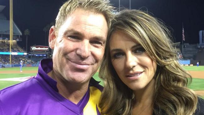 Shane Warne with Elizabeth Hurley after the Cricket All Stars clash in the US.