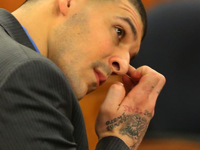 FALL RIVER, MA - APRIL 7: Closing arguments in the Aaron Hernandez trial for the murder of Odin Llyod at Fall River Superior Court. Hernandez wipes his face as he listens to the judge speak to the jury. (Photo by John Tlumacki/The Boston Globe via Getty Images)