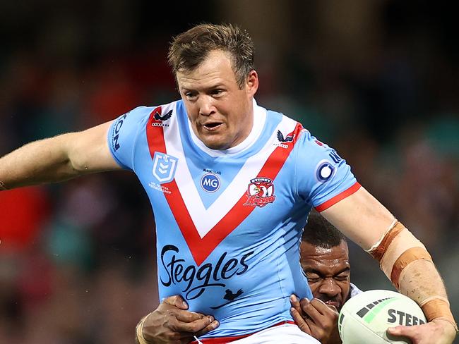 SYDNEY, AUSTRALIA - APRIL 25: Josh Morris of the Roosters is tackled by Mikaele Ravalawa of the Dragons during the round seven NRL match between the Sydney Roosters and the St George Illawarra Dragons at the Sydney Cricket Ground, on April 25, 2021, in Sydney, Australia. (Photo by Cameron Spencer/Getty Images)