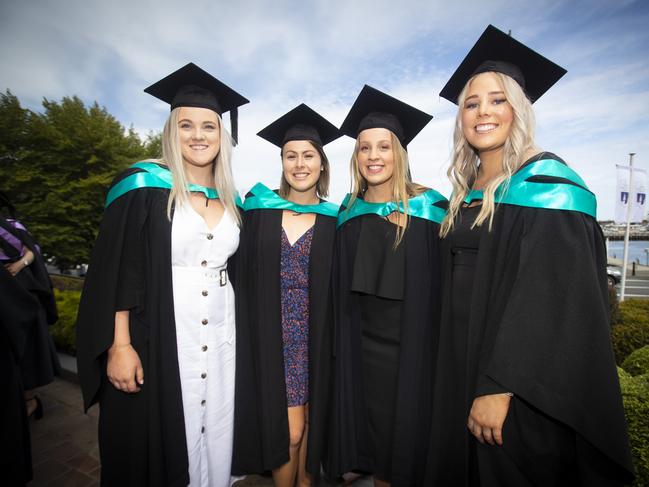 Lucy Oates, Hannah Watson, Dimitria Jaynes and Ellen Batge at UTAS graduations held at the Hobart Grand Chancellor. Picture: LUKE BOWDEN