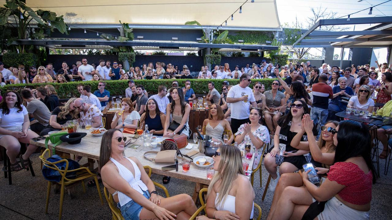 Adelaide footy fans soak up the 2023 Grand Final action. Picture: Emma Brasier