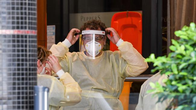 Medical staff prepare to test returned travellers for COVID-19 at Peppers Hotel. Picture: Brenton Edwards