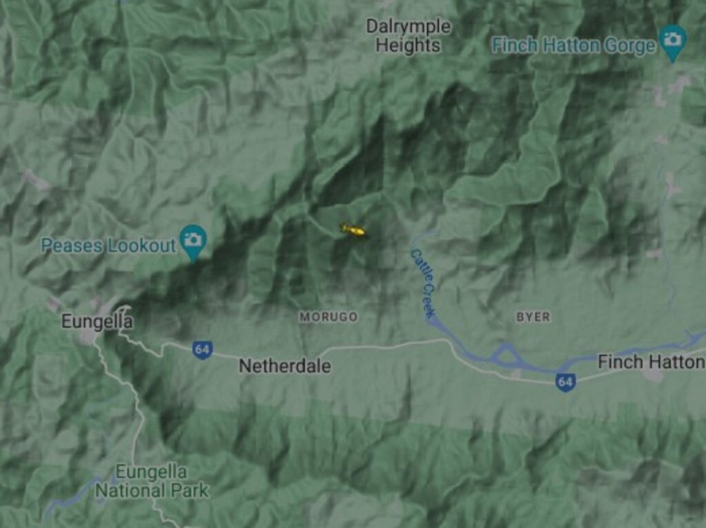 The RACQ CQ Rescue chopper is hovering over a section of mountainous area between Finch Hatton and Eungella. Picture: from flightrader24