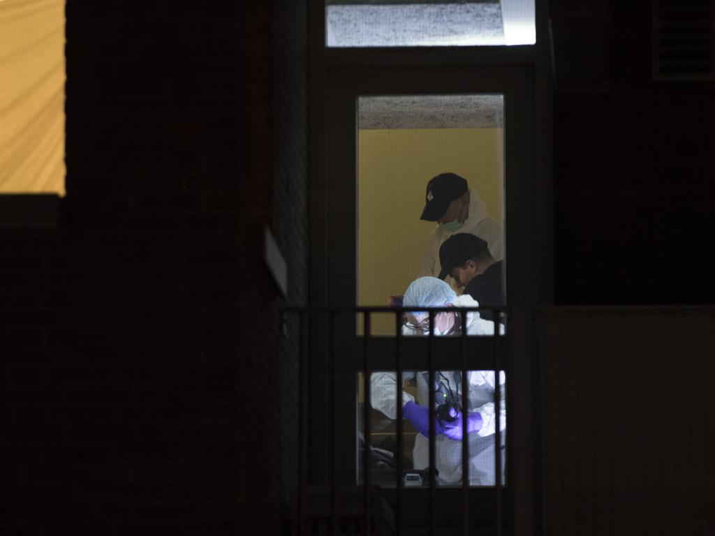 Forensic experts look for clues in a house where the suspect of the shooting was arrested in Utrecht, Netherlands. Picture: AP