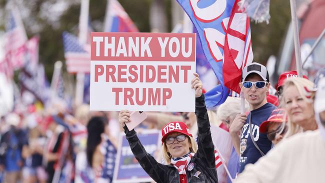 Supporters of former President Donald Trump await his return to Florida on January 20. Picture: Michael Reaves/Getty Images/AFP