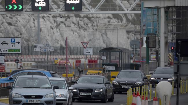 Cars leave Dover Port after disembarking a ferry returning from France to beat the deadline for quarantine imposed by the UK government. Picture: Getty Images