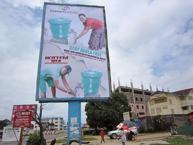 A billboard promotes the washing of hands to prevent the spread of the deadly Ebola virus in Monrovia, Liberia. Picture: Jonathan Paye-Layleh