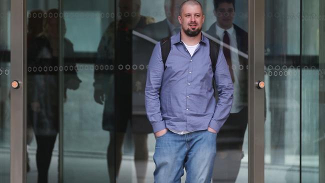 Far-right activist Neil Erikson leaves the Federal Court in Melbourne. Picture: AAP