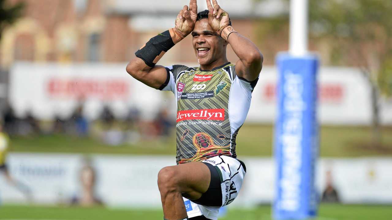 KANGAROO DANCE: Ipswich&#39;s triple tryscorer Michael Purcell celebrates his super effort against Easts last weekend with a tribal dance. Picture: Cordell Richardson