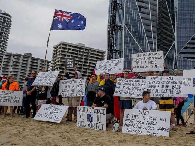 Workers from the Jewel development protesting at the Jewel International Kite Festival on Sunday at Surfers Paradise. Spokesman Scott Vink said instead of being inside having canapes, the Yuhu Group bosses should have been out explaining to labourers out of work what was going on. Picture: Jerad Williams