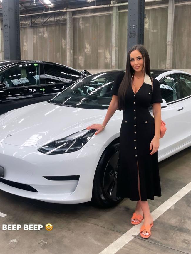 Taylor Jayne "TJ" Touma, who also lives at the Hunters Hill home, had her white Tesla destroyed in the firebombing on Monday morning. There is no suggestion of any wrongdoing by Ms Touma. Photo: Instagram