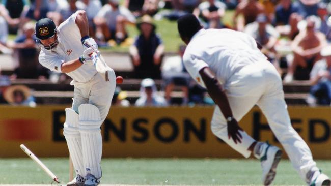 Devon Malcolm rips through Steve Waugh’s defences in 1995.