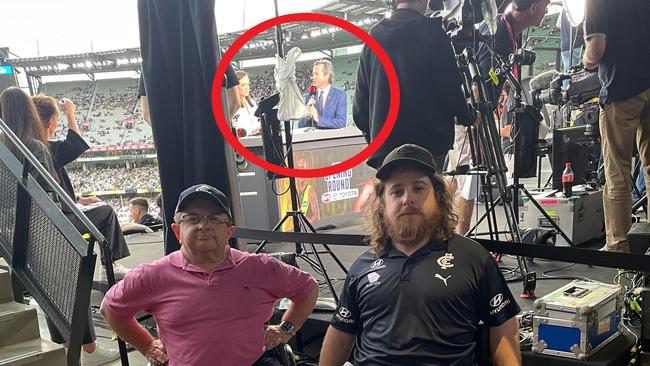 James Williams at the MCG with the Channel 7 studio behind him. Photo: Twitter, @CripsyAU