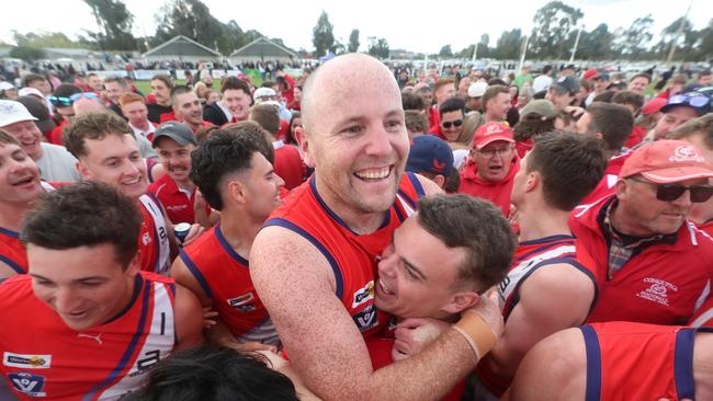 Congupna veteran Josh Chapman joins in the celebrations after the one-point grand final win over Finley.