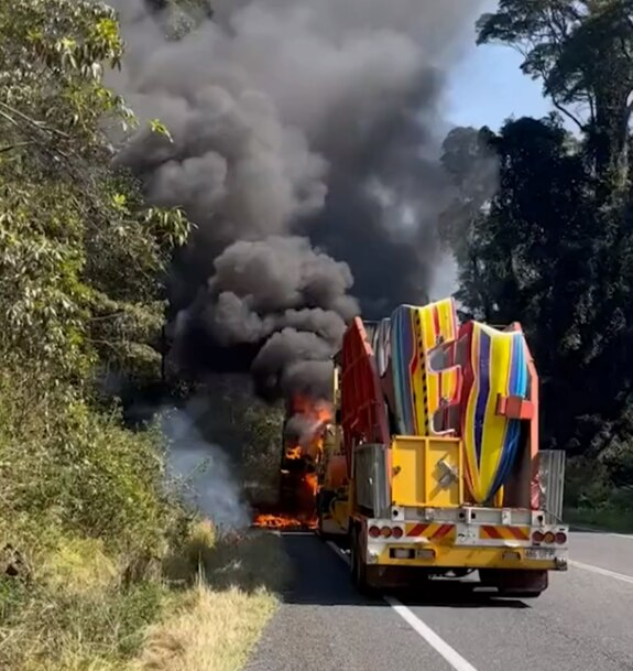 A truck carrying a carnival ride erupted in flames and caused major delays along the Cunningham Highway (Photo: 9News Queensland)