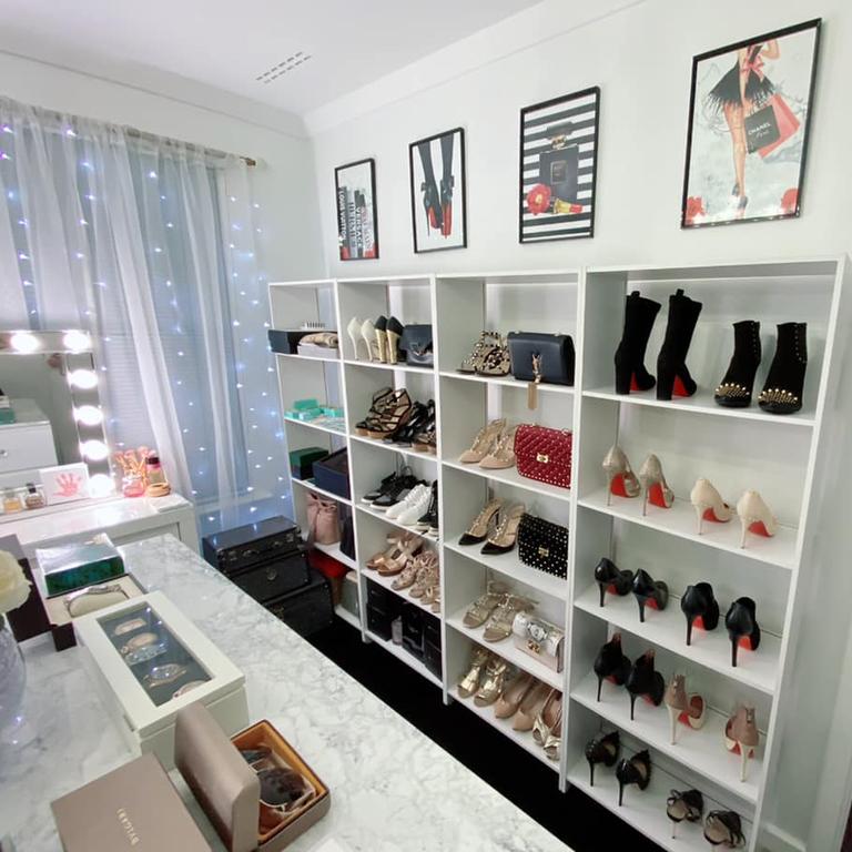 They used Billy bookcases from Ikea to showcase her bags and shoes.