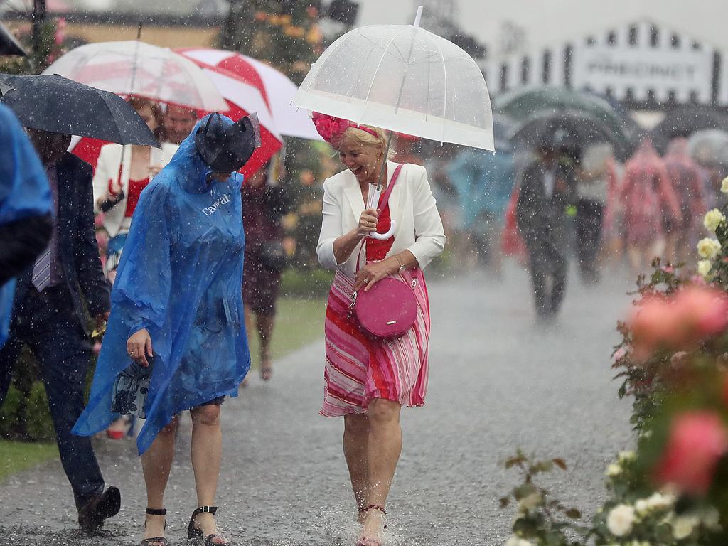 The 2018 Lexus Melbourne Cup at Flemington Racecourse. Flooding rain hits the track. Picture: Alex Coppel