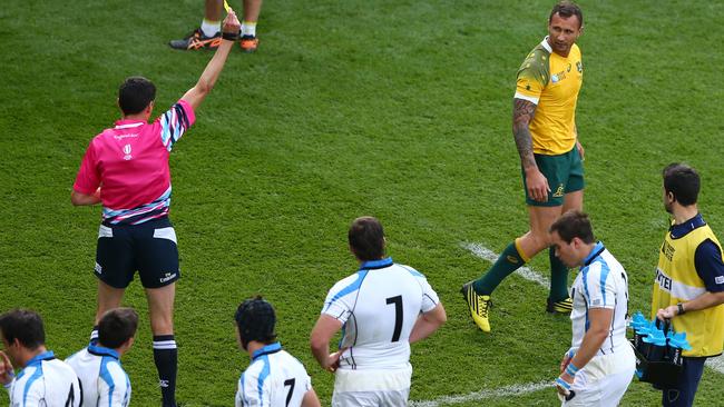 BIRMINGHAM, ENGLAND - SEPTEMBER 27: Quade Cooper of Australia leaves the field after being shown a yellow card by referee Pascal Gauzere during the 2015 Rugby World Cup Pool A match between Australia and Uruguay at Villa Park on September 27, 2015 in Birmingham, United Kingdom. (Photo by Michael Steele/Getty Images)