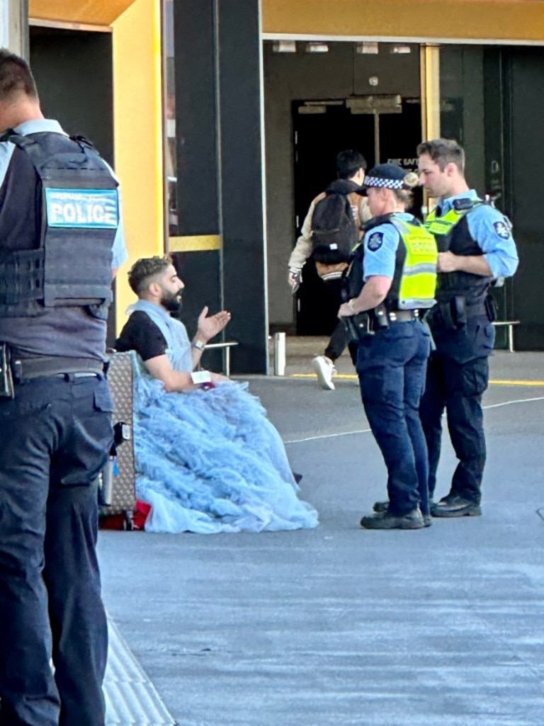 Deni Todorovic at Melbourne airport with federal police. Picture: Supplied / The Daily Telegraph