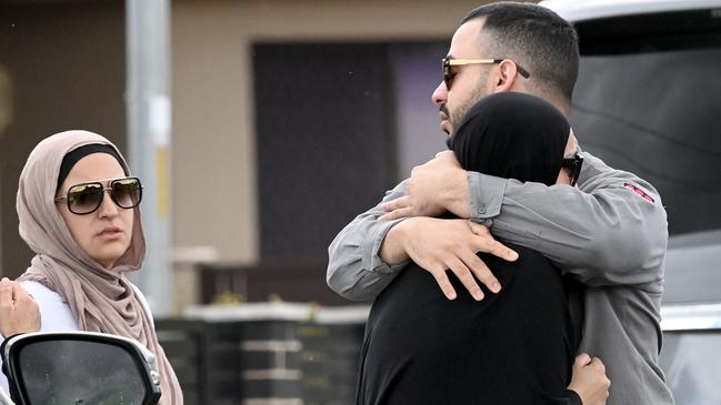 Distressed family and friends at the scene of the shooting. Picture: NCA NewsWire / Jeremy Piper
