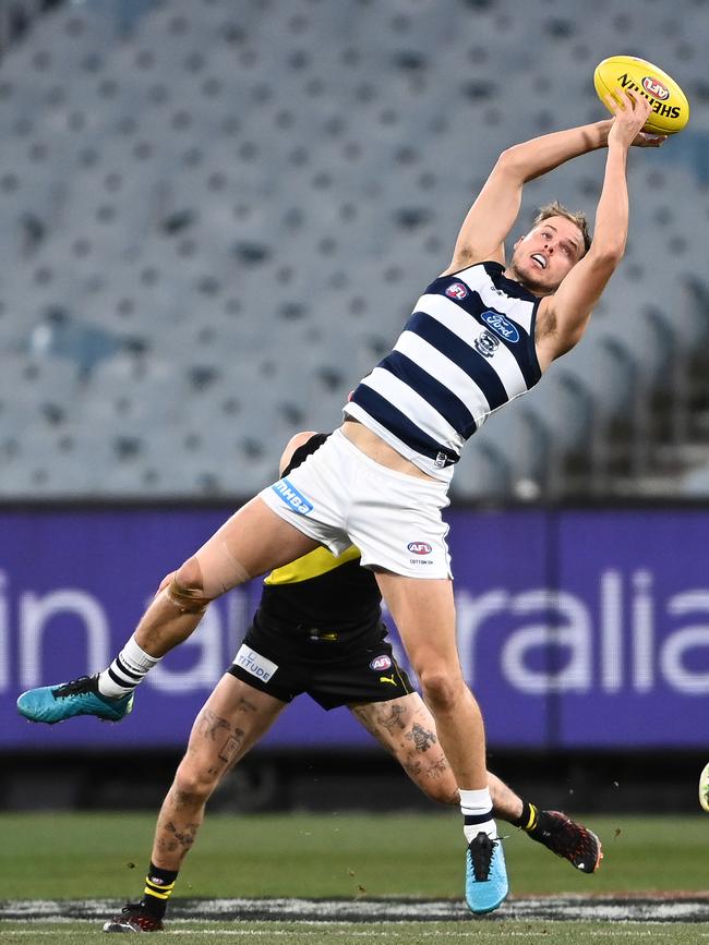 ake Kolodjashnij of the Cats marks during the round 19 AFL match between Geelong Cats and Richmond Tigers at Melbourne Cricket Ground on July 25, 2021 in Melbourne, Australia. (Photo by Quinn Rooney/Getty Images)