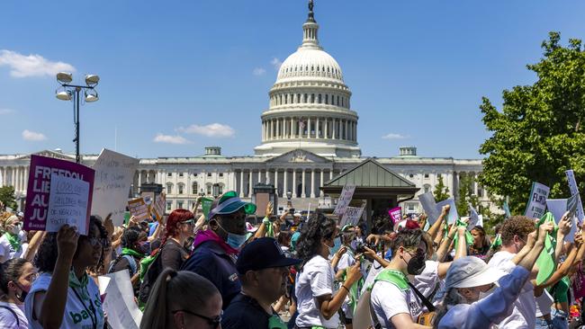 Abortion rights activists protest outside the US Supreme Court.