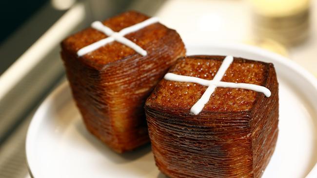 Pictured at Banksia Bakehouse on George Street at the The Rocks in Sydney is an Easter Cube-Saint baked by pastry chef Juan Garces. Picture: Richard Dobson