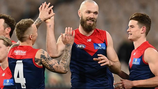 MELBOURNE, AUSTRALIA - JUNE 04: Max Gawn of the Demons is congratulated by team mates after kicking a goal during the round 12 AFL match between the Melbourne Demons and the Sydney Swans at Melbourne Cricket Ground on June 04, 2022 in Melbourne, Australia. (Photo by Quinn Rooney/Getty Images)