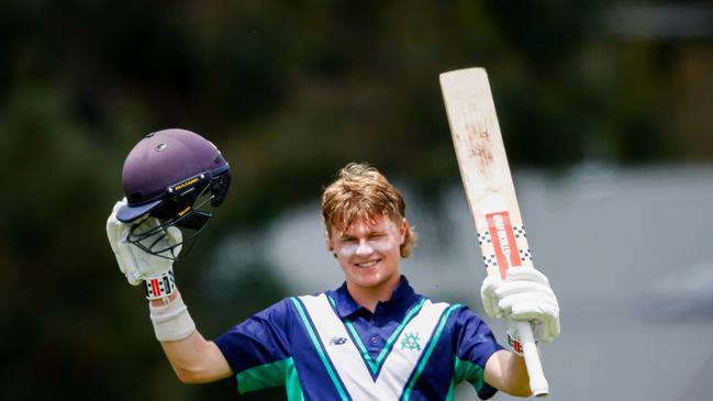 Oliver Peake raises the bat after a hundred against Tasmania during the Under-17 national championships. Picture: Dylan Burns.