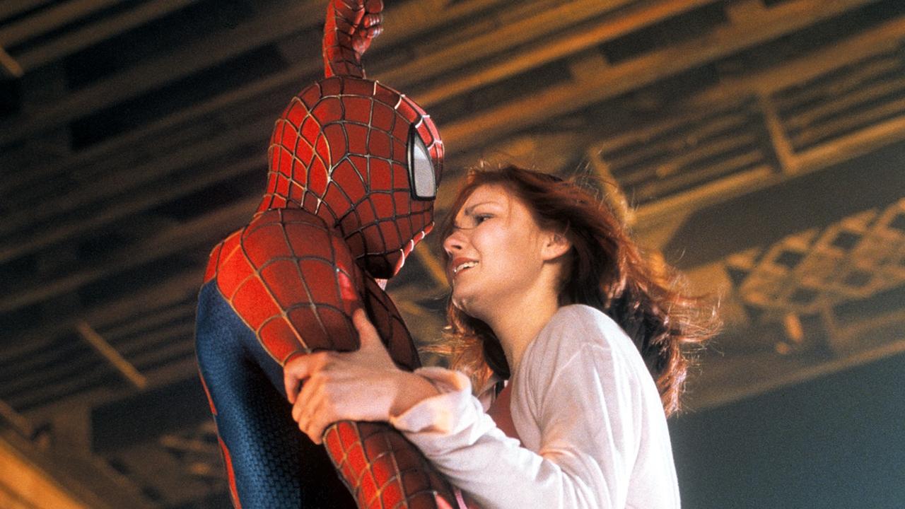 Tobey Maguire with Kirsten Dunst in scene from Spider-Man. 