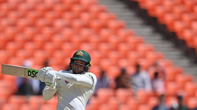 Australia's Usman Khawaja plays a shot during the second day of the fourth and final Test cricket match between India and Australia at the Narendra Modi Stadium in Ahmedabad on March 10, 2023. (Photo by Punit PARANJPE / AFP) / ----IMAGE RESTRICTED TO EDITORIAL USE – STRICTLY NO COMMERCIAL USE-----