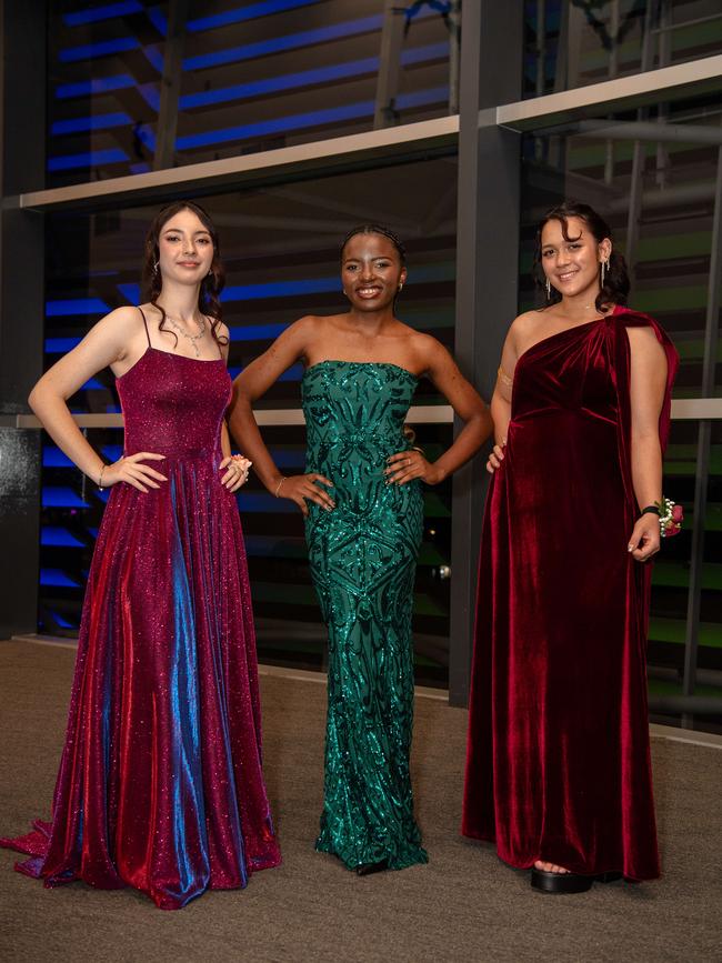Amelia Espie, Valerie Balu and Taya-Mai Ducay at the Year 12 School formals of NT Christian College at Darwin Convention Centre, Darwin. Picture: Pema Tamang Pakhrin.