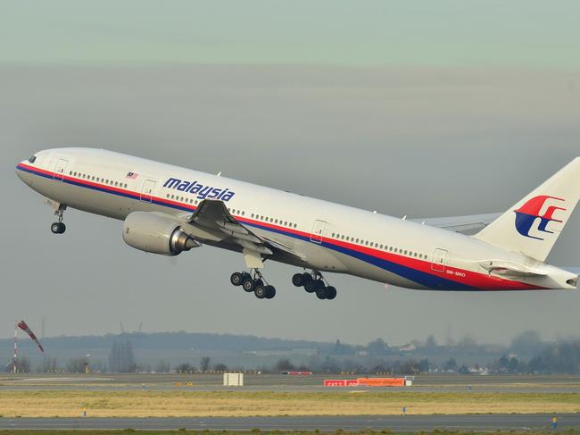 MH370 - Malaysia Airlines Boeing 777-200ER (9M-MRO) taking off at Roissy-Charles de Gaulle Airport (LFPG) in France.