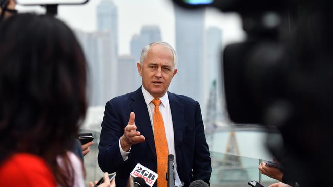 Australia's Prime Minister Malcolm Turnbull speaks to journalists at a press conference in Hong Kong where he attacked Bill Shorten over the citizenship crisis.