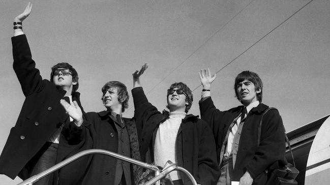 MAKING WAVES: The Beatles. The Beatles leave Sydney airport for New Zealand, 21 June 1964. Photo: A Kemp/Fairfax Syndication.
