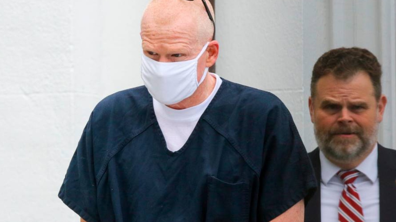 Alex Murdaugh is escorted out of the Colleton County Courthouse in Walterboro on Wednesday, July 20, 2022, after pleading not guilty and being denied bond hearing on charges of murdering his wife and son. (Tracy Glantz/The State/Tribune News Service via Getty Images)