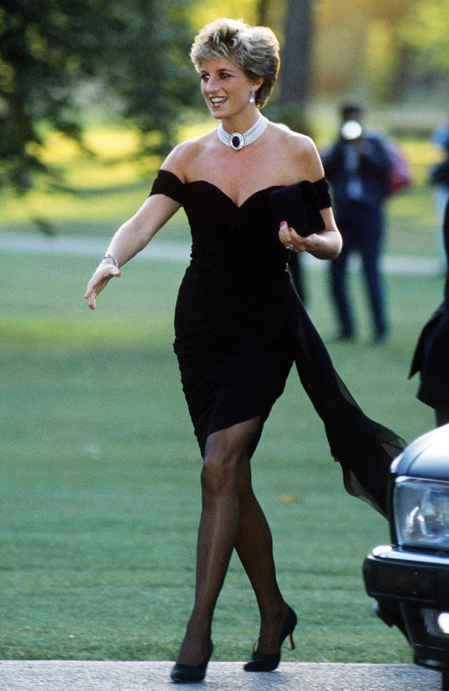 Diana’s Style: 1994 - Diana radiated glamour on the night Prince Charles made his famous confession of adultery on prime time TV. Diana arrived at the Serpentine Gallery in a stunning Christina Stambolian dress that knocked her husband off the front pages. The gown became known forever more as the “Revenge Dress”. Picture: Getty