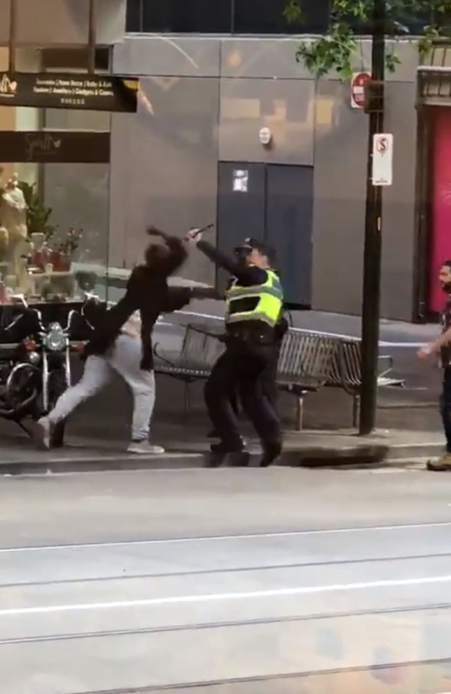 The Bourke Street attacker attempts to stop police from intervening.