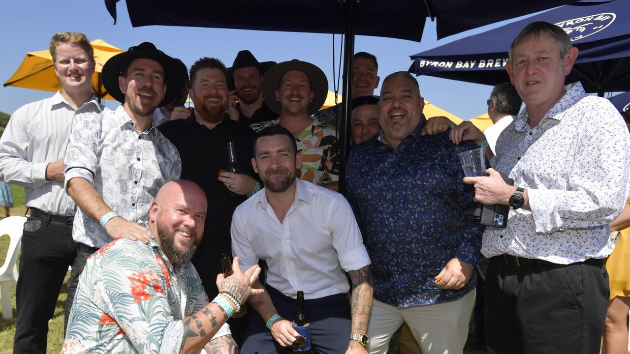 A bunch of mates from Haymans Electrical in South Lismore living it up at the Lismore Cup on Thursday.