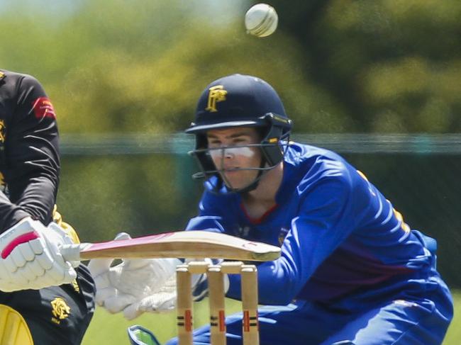 Premier Cricket Rd 2: Frankston Peninsula v Monash Tigers. Mitch Perry (Frankston) and Monash keeper Brody Eccles. Picture: Valeriu Campan