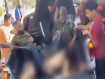 Screen grab of video showing Louk being paraded in a truck by Hamas. Picture: Supplied